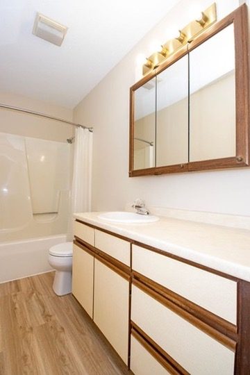 Bathroom with tub and shower