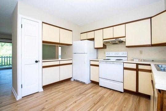 Kitchen with white appliances