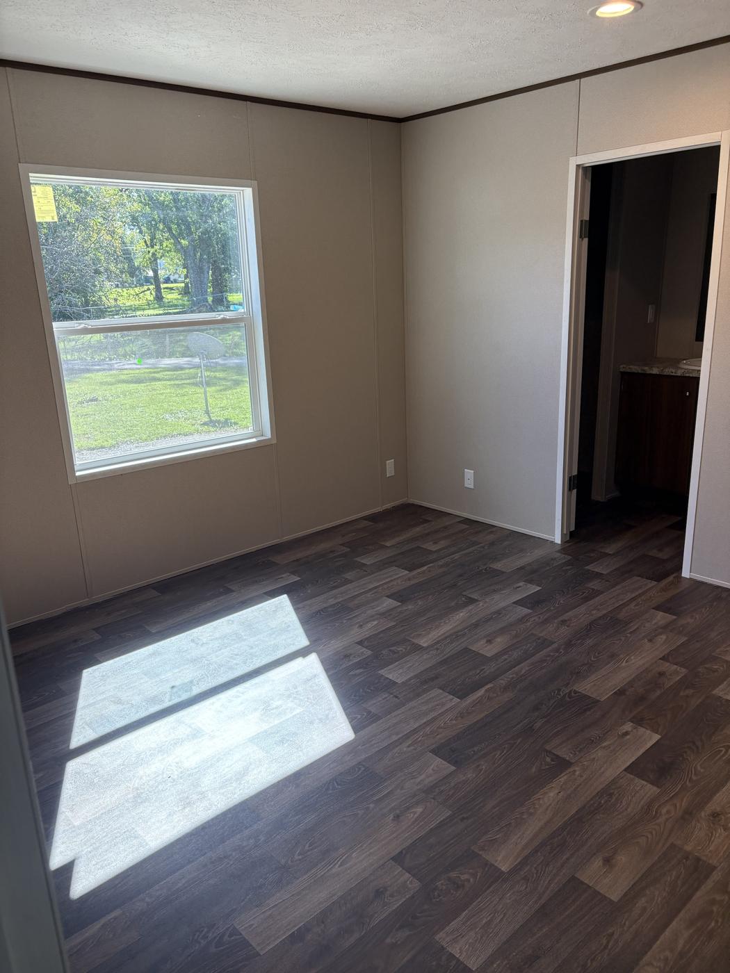 Sunny living room with a large window